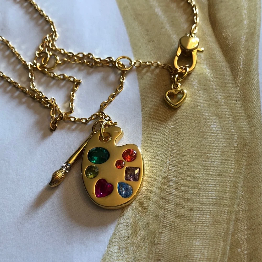 Authentic New with tag Kate spade Gold Artist Palette Necklace